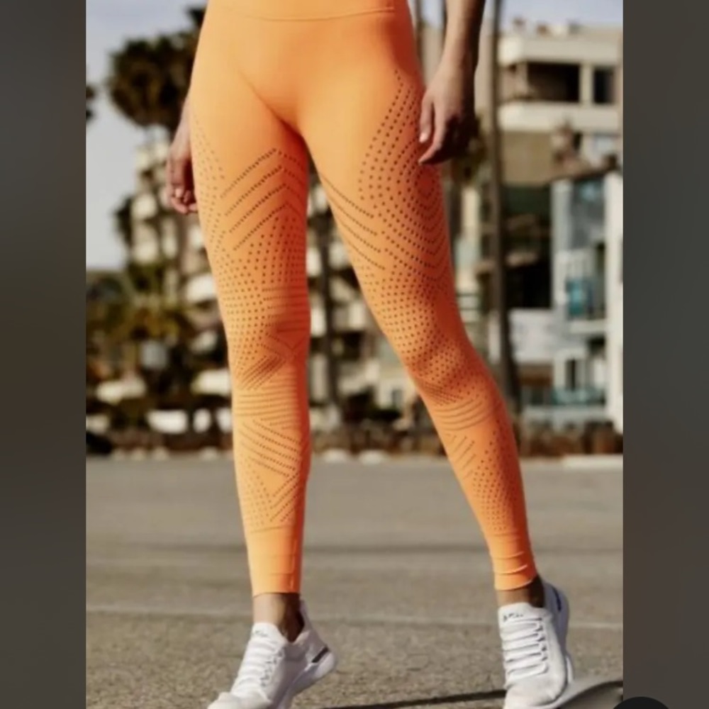 🧡SOLD🧡 NWOT Fp Movement by Free People Ecology Leggings in Mango. Size Large.